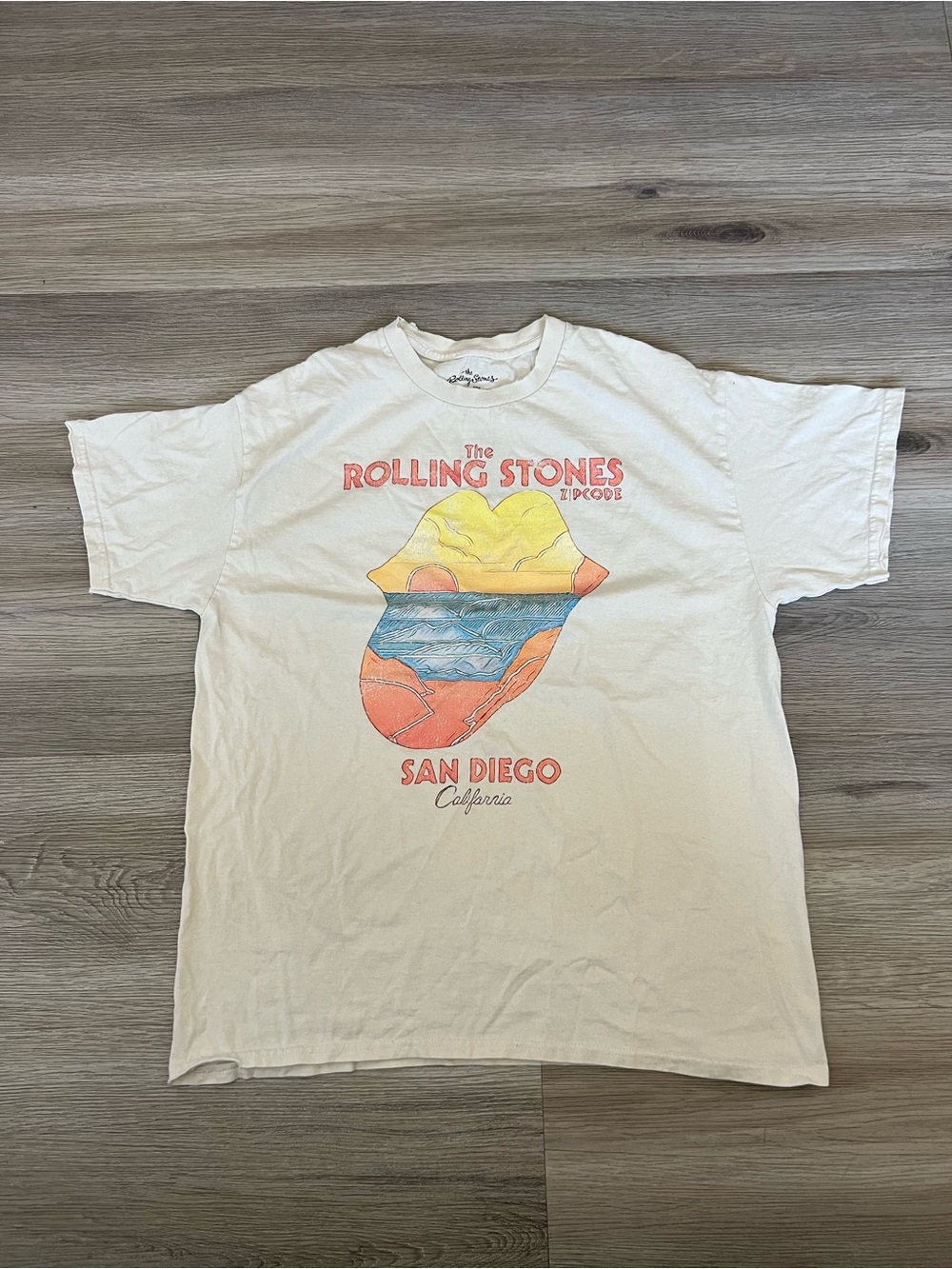 the Rolling Stones White Short Sleeve Tee with Yellow, Blue & Orange Graphic